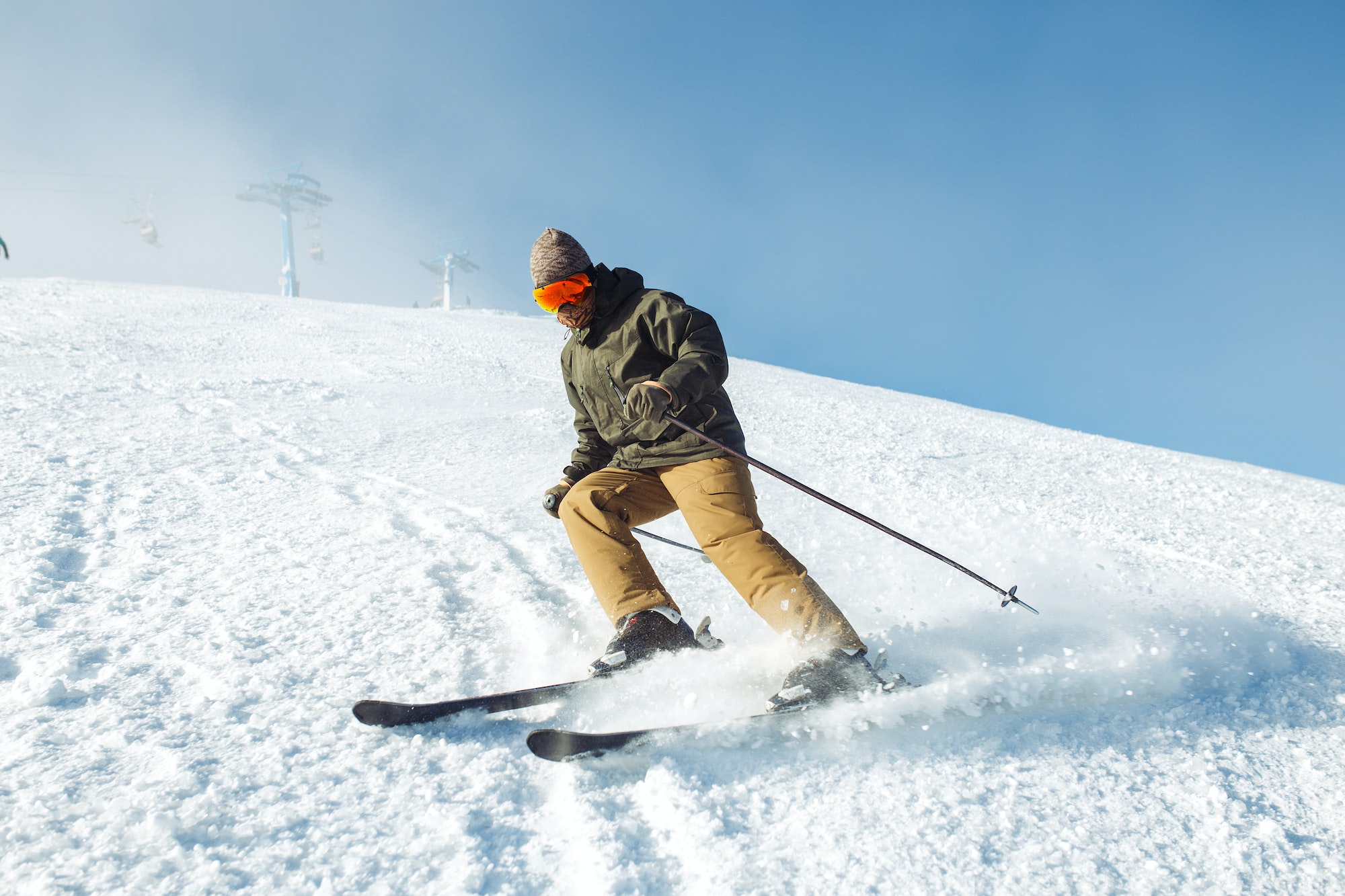 Man skiing in the mountains. Skiing in the snowy mountains, Winter is coming. Active lifestyle.